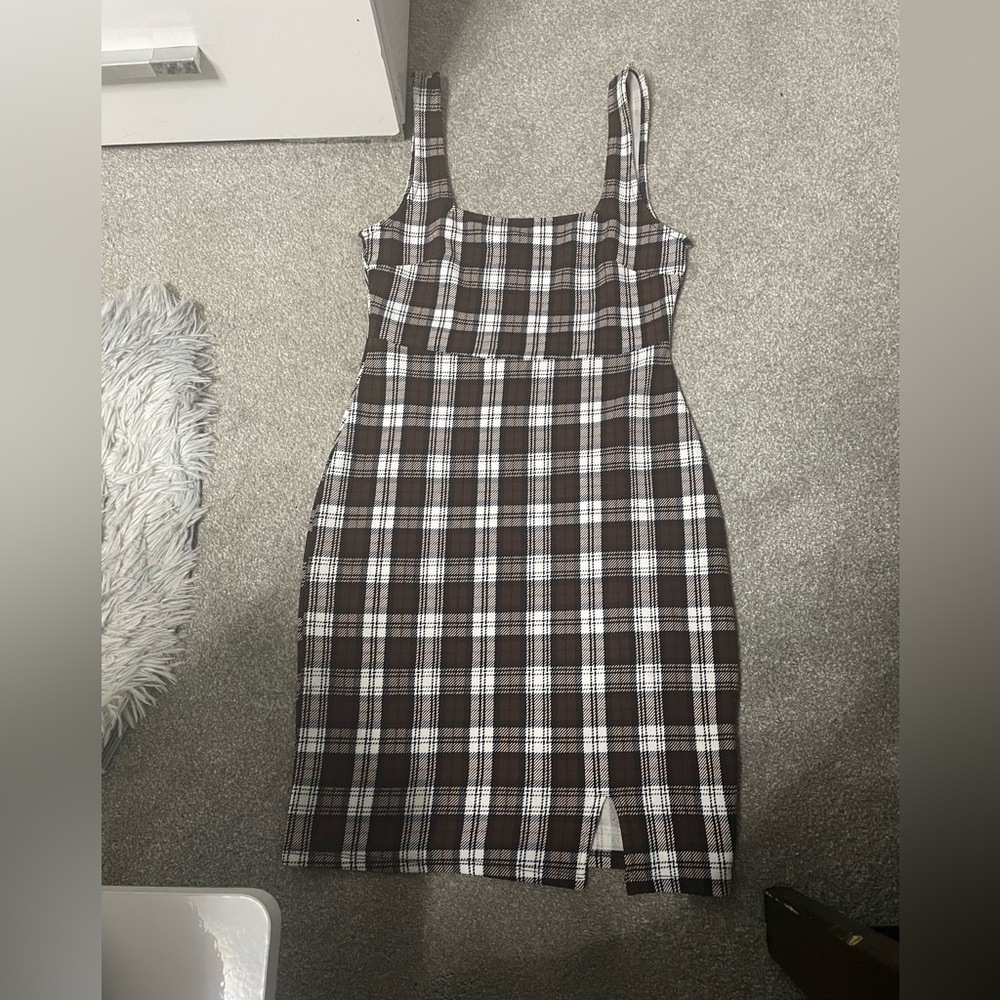 Almost Famous Brown and White Plaid dress with a slit on the side.